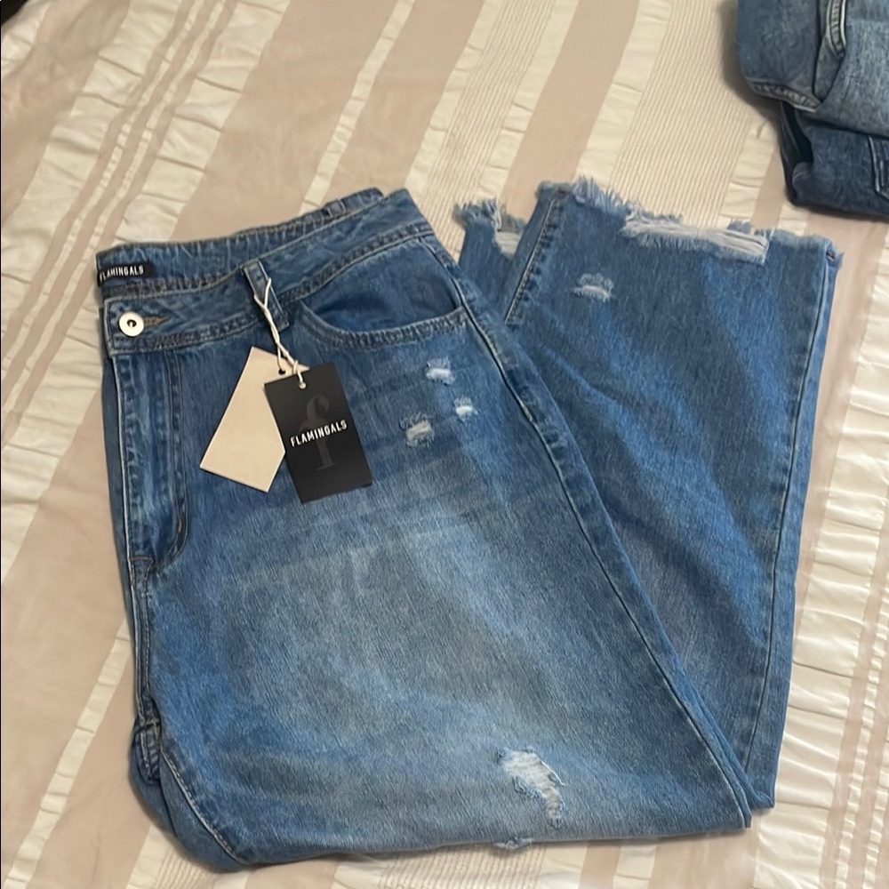 Blue Relaxed Fit Jeans with Distressed Details